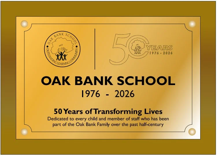 Gold plaque reading Oak Bank School 1976 to 2026, 50 Years of Transforming Lives, dedicated to every child and member of staff who has been part of the Oak Bank Family over the past half-century